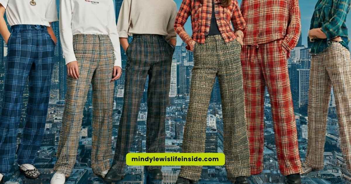 A group of four people wearing coordinated plaid outfits, highlighting the current style trend of plaid pants.