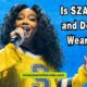 Image depicting the inquiry about SZA's faith and hijab-wearing, highlighting discussions on her personal beliefs and style.