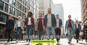 A pair of stylish Bermuda jeans displayed on a wooden surface, questioning their must-have status in fashion.