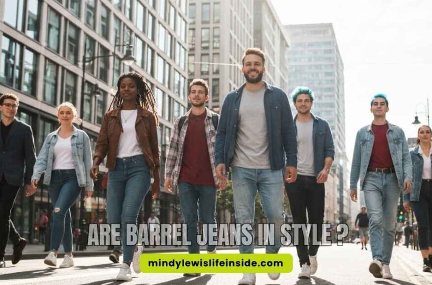 A pair of stylish Bermuda jeans displayed on a wooden surface, questioning their must-have status in fashion.