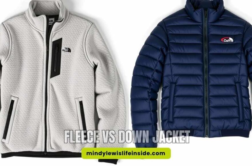 Alt text: "Two jackets side by side on a white background. Left is a light gray fleece jacket with black zippers; right, a dark blue down jacket. Text reads 'Fleece vs Down Jacket' and website 'mindylewislifeinside.com' below."