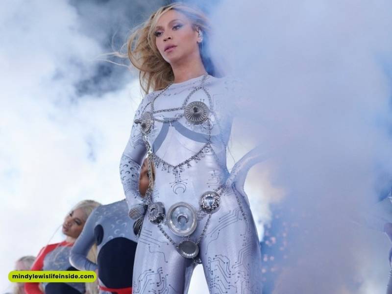 Beyoncé performs in a stunning outfit during the Super Bowl halftime show, captivating the audience with her energy.