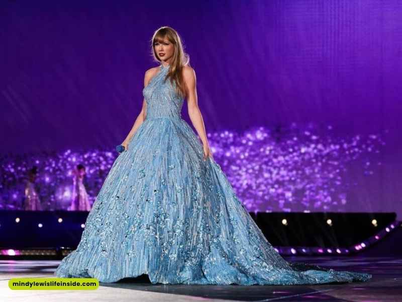 Taylor Swift takes the stage at the 2013 American Music Awards, dressed elegantly and engaging the audience with her performance.