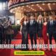 Elegant group in formal attire poses on a red carpet at a movie premiere. Paparazzi capture the moment. Text reads "Movie Premiere Dress to Impress Outfit Ideas."
